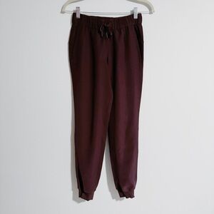 Lululemon - Burgundy On The Fly Woven Jogger Pants